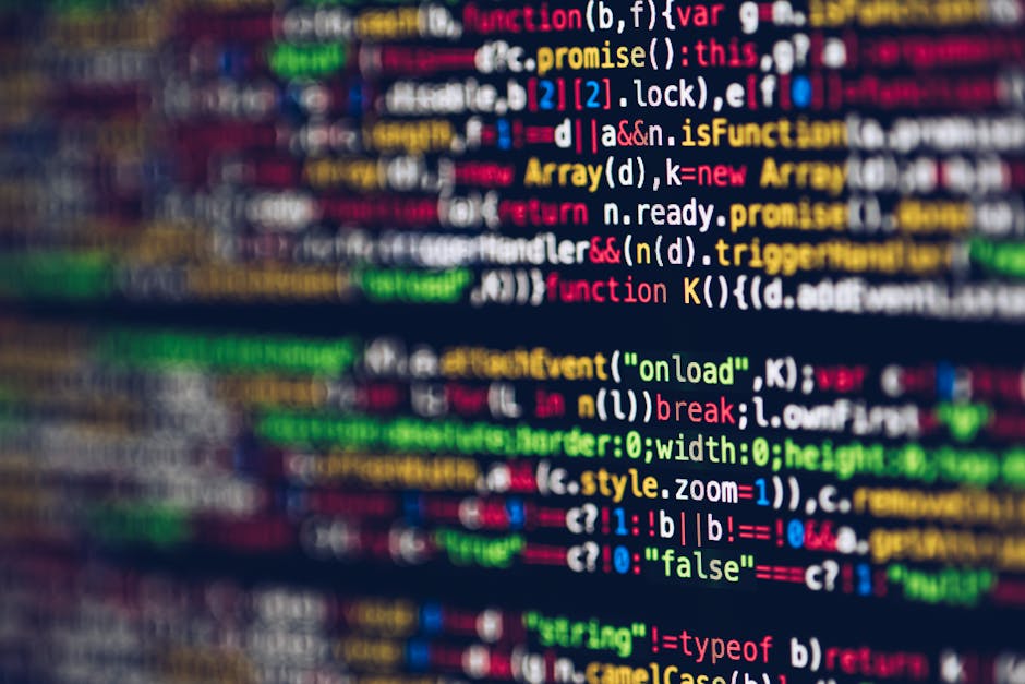 A close-up photograph of a computer screen displaying HTML and CSS code within a text editor or integrated development environment. The code includes tags such as <!DOCTYPE html>, <html>, <head>, <met